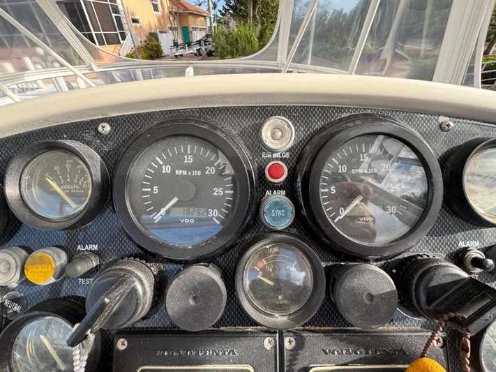  Yacht Photos Pics Dashboard of a 2002 Riviera 40 Convertible boat with gauges and controls.