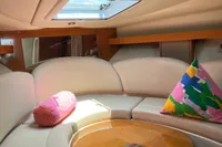 2009 Chaparral 290 Signature interior with cozy seating and colorful pillows.