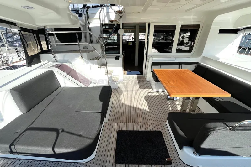  Yacht Photos Pics Spacious 2019 Lagoon 52 S yacht interior with seating and dining area.