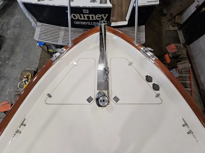 Lady One Yacht Photos Pics Bow of 2003 Legacy 40 Hardtop Express boat with anchor and deck details.