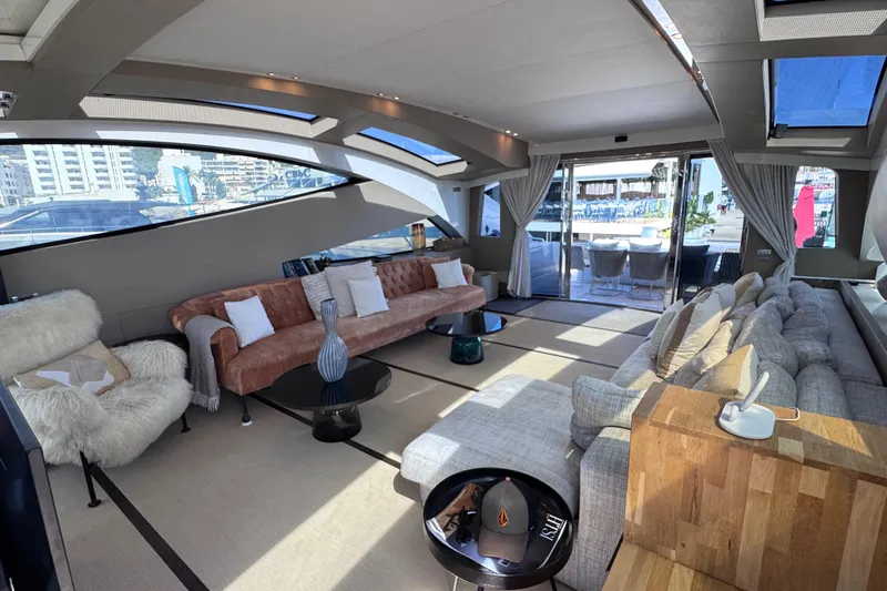  Yacht Photos Pics Luxurious interior of 2010 Canados 90 yacht with plush seating and modern decor.