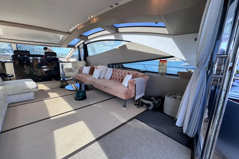  Yacht Photos Pics Luxurious interior of 2010 Canados 90 yacht with elegant seating and panoramic windows.