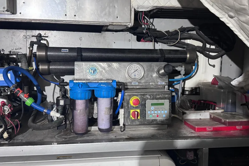  Yacht Photos Pics Engine room equipment on a 2010 Canados 90 yacht, featuring filtration and control systems.