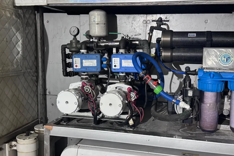  Yacht Photos Pics Engine room machinery of a 2010 Canados 90 yacht, featuring pumps and filtration system.