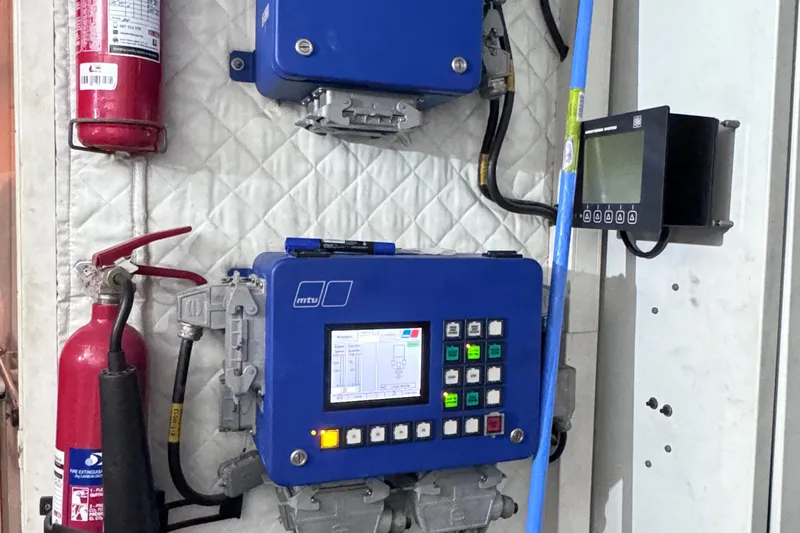  Yacht Photos Pics Control panel and fire extinguisher on a 2010 Canados 90 yacht.