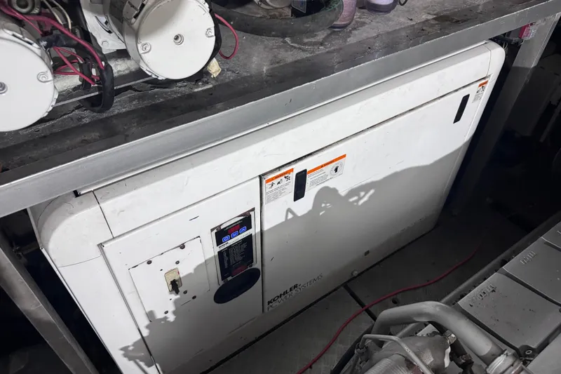  Yacht Photos Pics Engine room of a 2010 Canados 90 yacht featuring Kohler power systems.