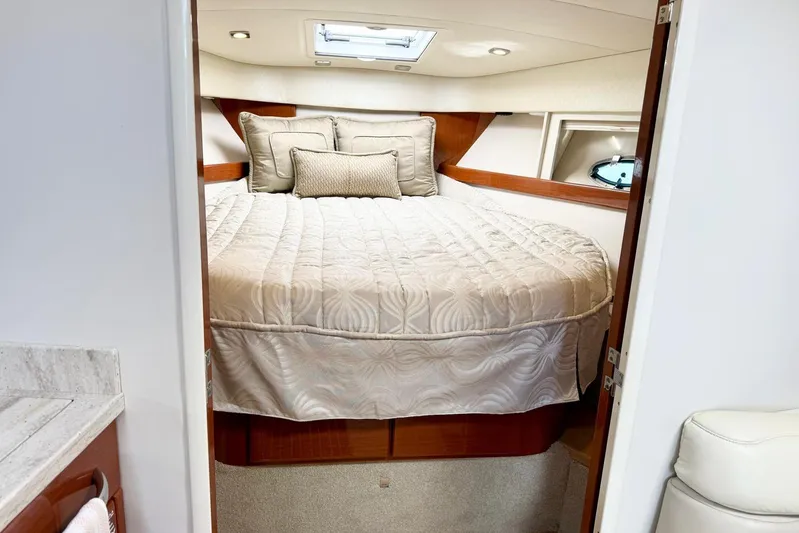 Game Changer Yacht Photos Pics Luxurious cabin interior of 2016 Formula 37 Performance Cruiser with plush bedding.