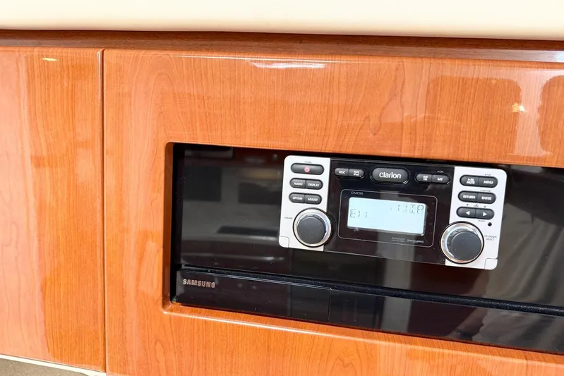 Game Changer Yacht Photos Pics 2016 Formula 37 Performance Cruiser interior with Clarion stereo and Samsung appliance.