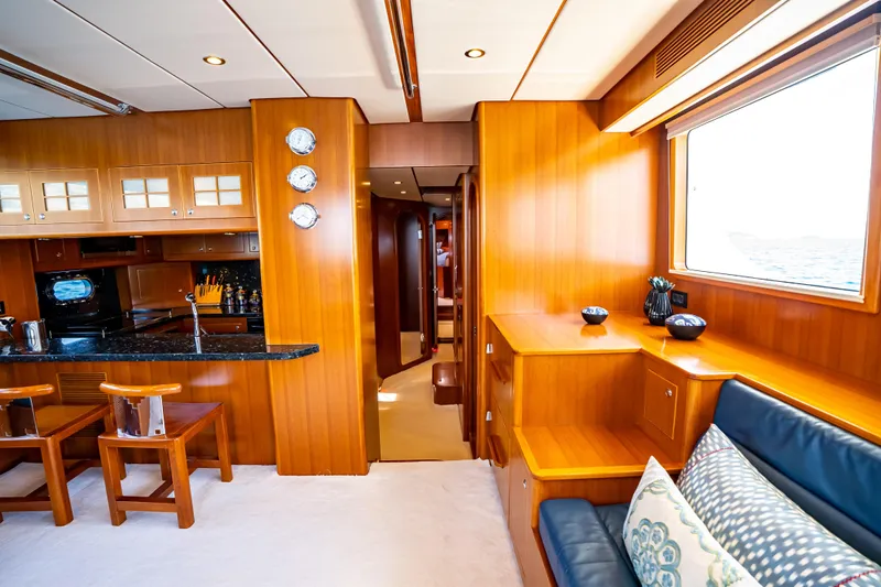  Yacht Photos Pics Luxurious interior of 2018 Nordhavn 60 yacht with wooden finishes and modern amenities.