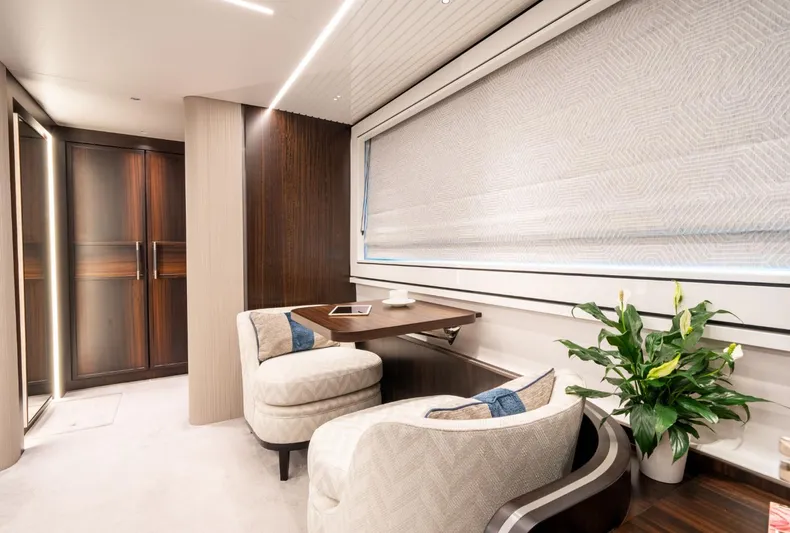 Yacht Photos Pics Luxurious interior of 2025 Sunseeker Ocean 182 yacht with elegant seating and modern decor.