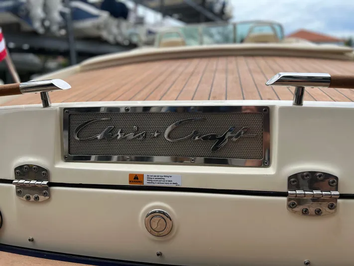  Yacht Photos Pics 2022 Chris-Craft Launch 27 boat with teak deck and chrome details.