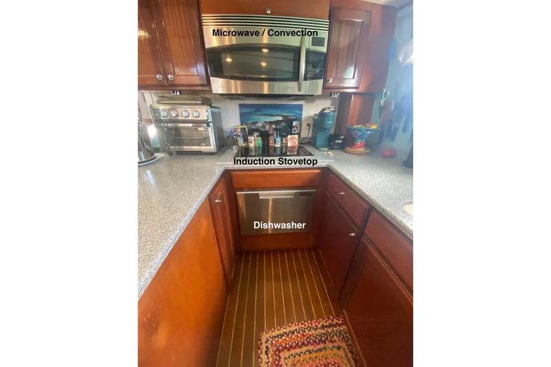 Ten Sigma (formerly Recently Korkzcrew) Yacht Photos Pics 2008 Great Harbour N37 kitchen with microwave, induction stovetop, and dishwasher.