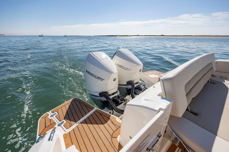  Yacht Photos Pics 2023 Boston Whaler 320 Vantage with dual Mercury engines on open water.