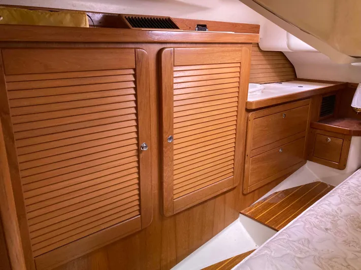  Yacht Photos Pics Interior of 2008 Catalina 470 yacht with wooden cabinets and drawers.
