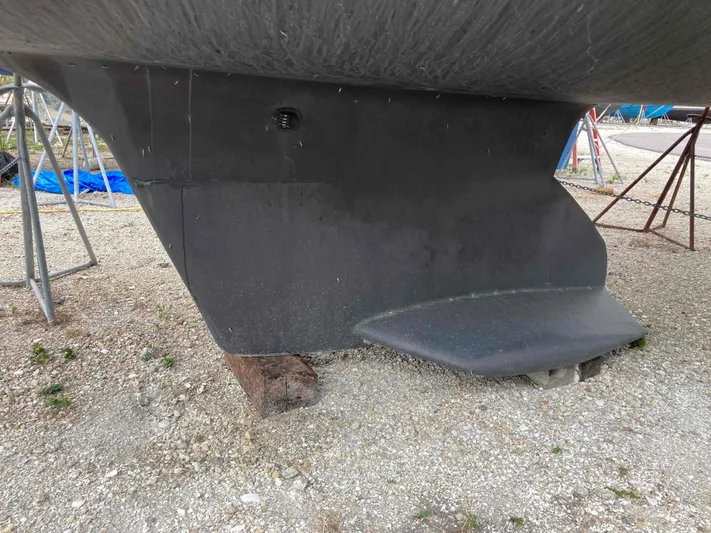  Yacht Photos Pics Catalina 470 sailboat keel, 2008 model, on dry dock with support stands.