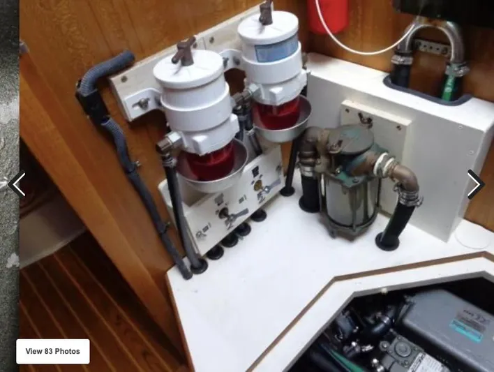  Yacht Photos Pics Engine room of a 2008 Catalina 470 sailboat with fuel filters and engine components.