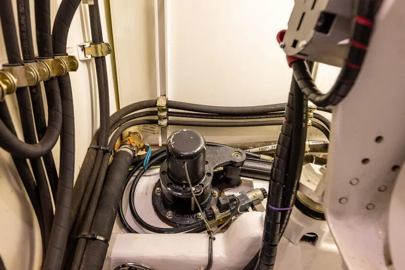 Kolokea Yacht Photos Pics Engine room of 2001 West Bay 58 yacht, showcasing mechanical components and wiring.