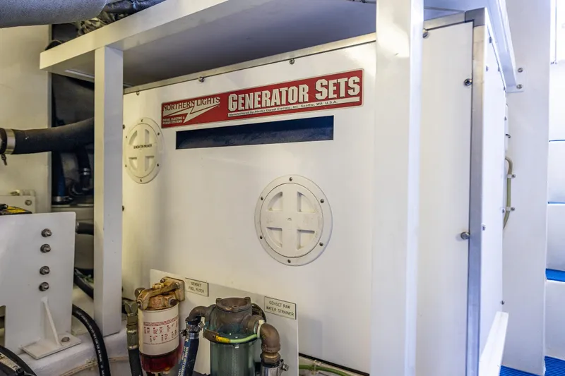 Kolokea Yacht Photos Pics Engine room of 2001 West Bay 58 yacht featuring Northern Lights generator.