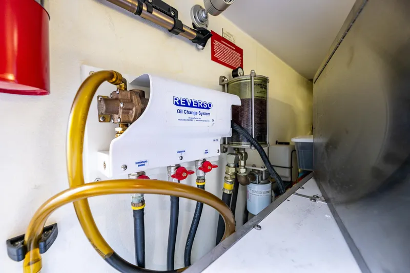 Kolokea Yacht Photos Pics Reverso oil change system in 2001 West Bay 58 yacht engine room.