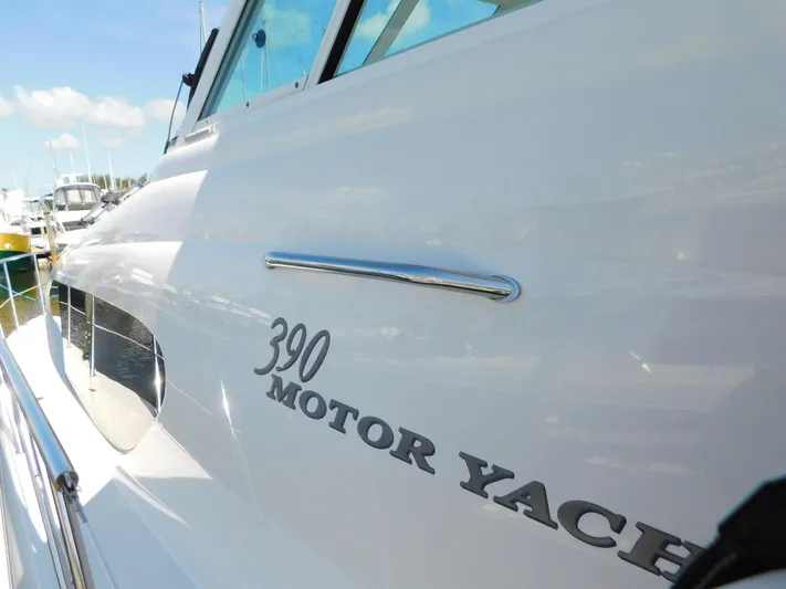 Just Rite Yacht Photos Pics 2004 Sea Ray 390 Motor Yacht side view with sleek design and chrome accents.