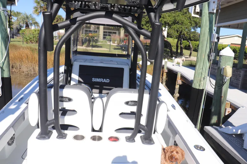  Yacht Photos Pics 2021 Costa Custom Boats 26 with Simrad display, docked with a dog onboard.