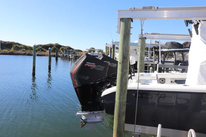 Yacht Photos Pics 2021 Costa Custom Boats 26 with Mercury Pro XS engine docked at marina.