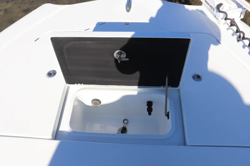  Yacht Photos Pics 2021 Costa Custom Boats 26, open storage compartment on deck, white finish.