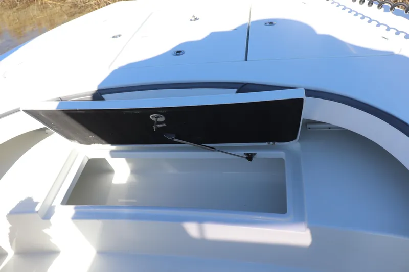  Yacht Photos Pics 2021 Costa Custom Boats 26 with open storage compartment on deck.