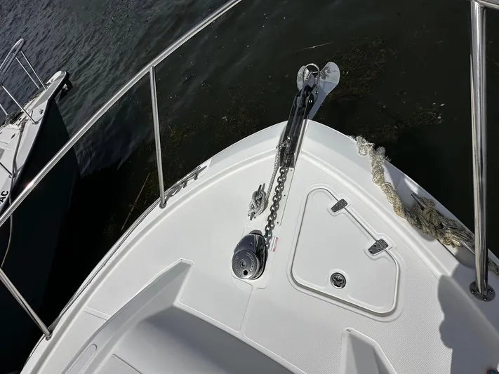  Yacht Photos Pics Bow of 2020 Boston Whaler 325 Conquest with anchor and chain.