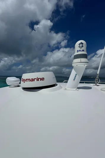  Yacht Photos Pics Boston Whaler 325 Conquest 2020 boat with Raymarine and FLIR equipment under cloudy sky.