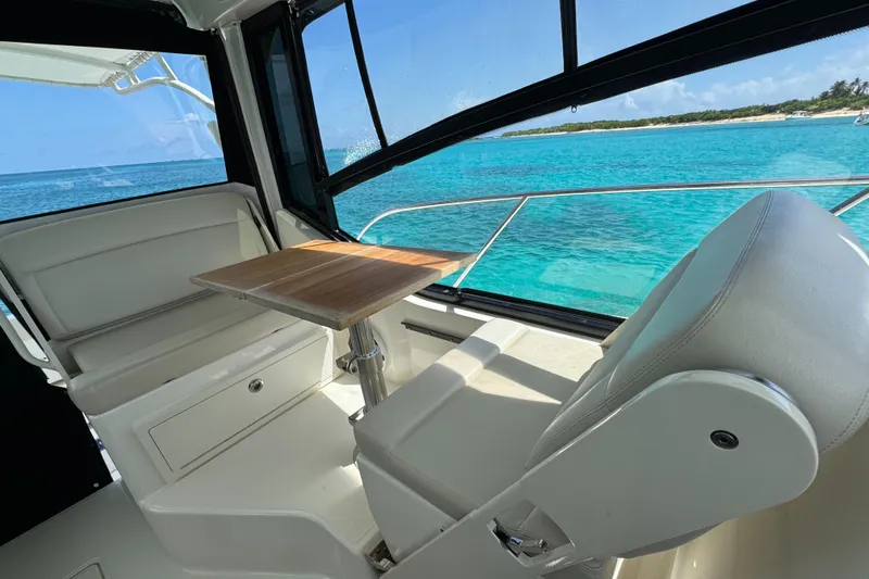  Yacht Photos Pics Interior of 2020 Boston Whaler 325 Conquest with ocean view through large windows.