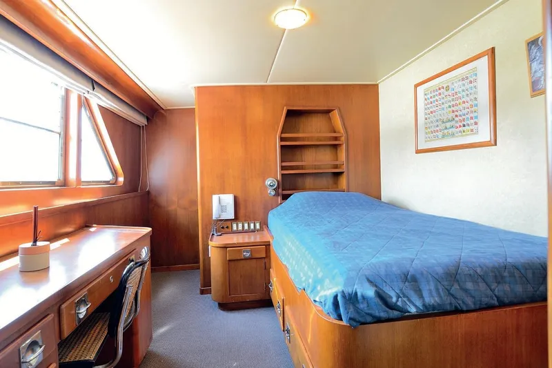 Madame Thelma Yacht Photos Pics Luxurious wooden cabin interior of 1975 CRN Ancona Navetta 40 yacht.