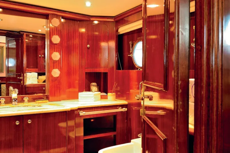 Madame Thelma Yacht Photos Pics Luxurious wooden interior of 1975 CRN Ancona Navetta 40 yacht bathroom.