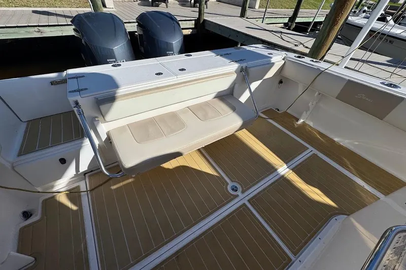  Yacht Photos Pics 2014 Stamas 317 Tarpon boat interior with seating and twin engines.