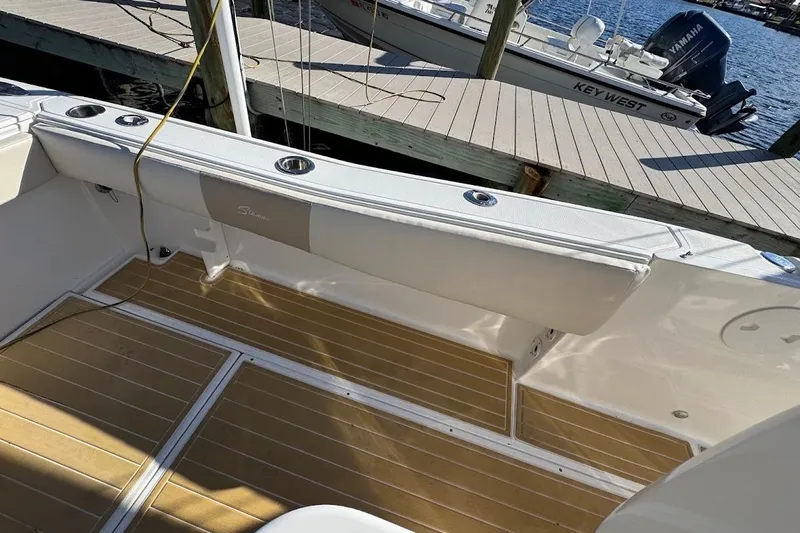  Yacht Photos Pics 2014 Stamas 317 Tarpon boat interior with teak flooring and docked at marina.