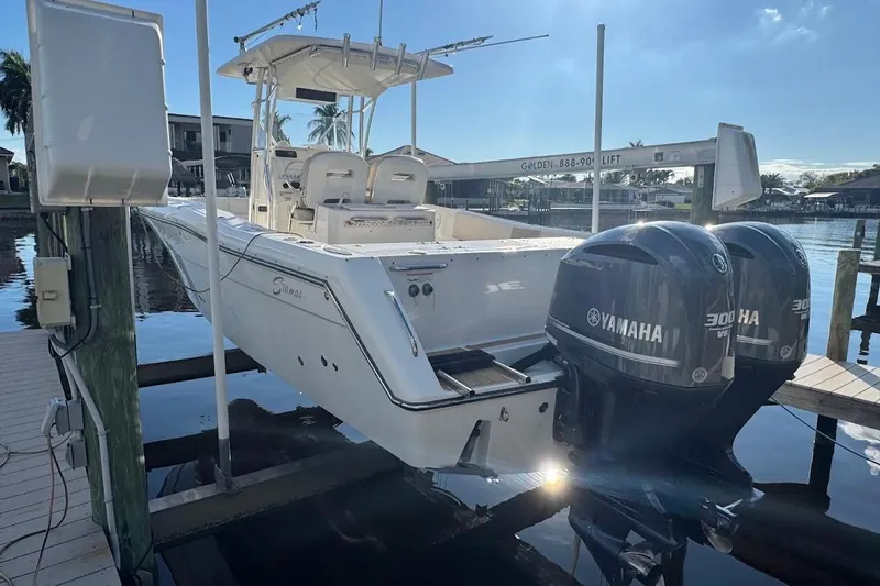  Yacht Photos Pics 2014 Stamas 317 Tarpon boat with dual Yamaha 300 engines docked at marina.