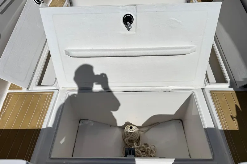  Yacht Photos Pics Open storage compartment on 2014 Stamas 317 Tarpon boat with rope inside.