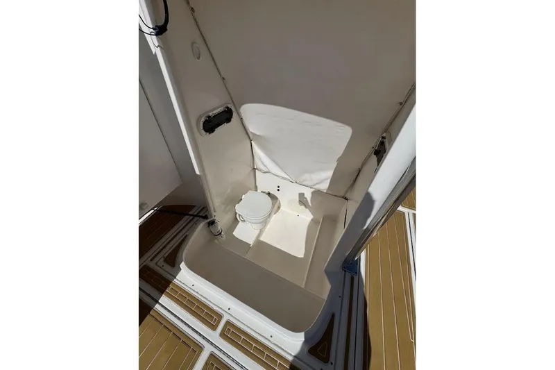  Yacht Photos Pics 2014 Stamas 317 Tarpon boat interior with compact marine toilet.