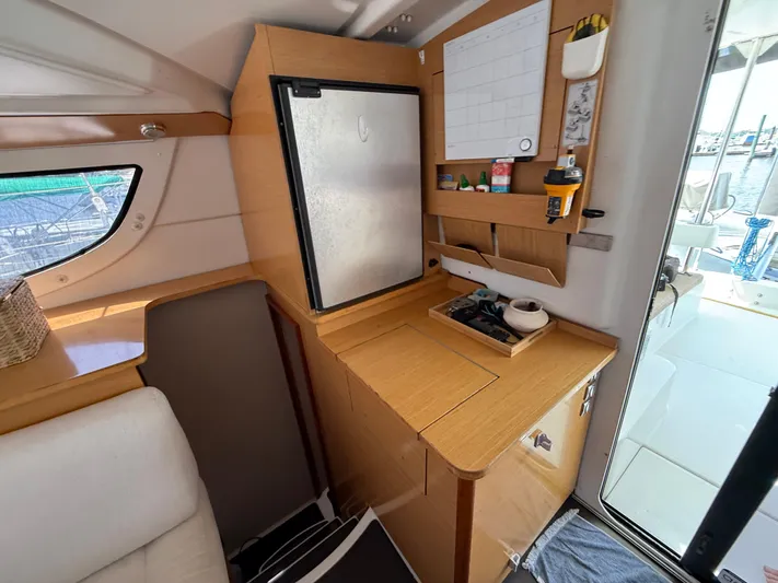 Benevah Yacht Photos Pics Interior of 2013 Fountaine Pajot Lipari 41 catamaran with compact kitchen area.