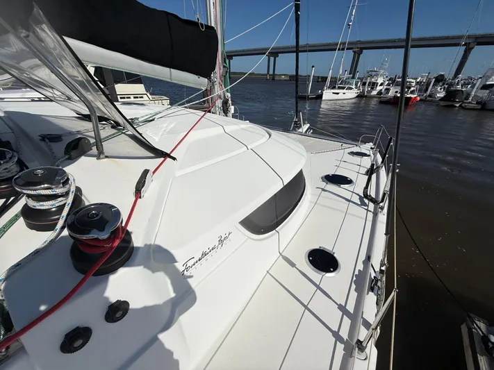 Benevah Yacht Photos Pics 2013 Fountaine Pajot Lipari 41 catamaran docked, showcasing deck and rigging details.