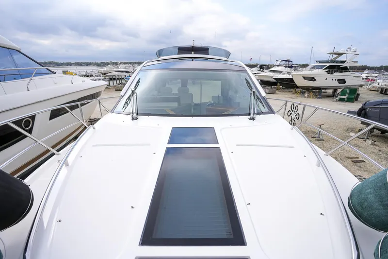  Yacht Photos Pics 2017 Galeon 43 SKY yacht docked at marina, front view.