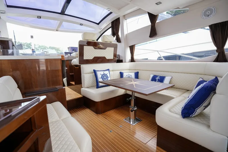  Yacht Photos Pics Luxurious interior of 2017 Galeon 43 SKY yacht with elegant seating and nautical decor.