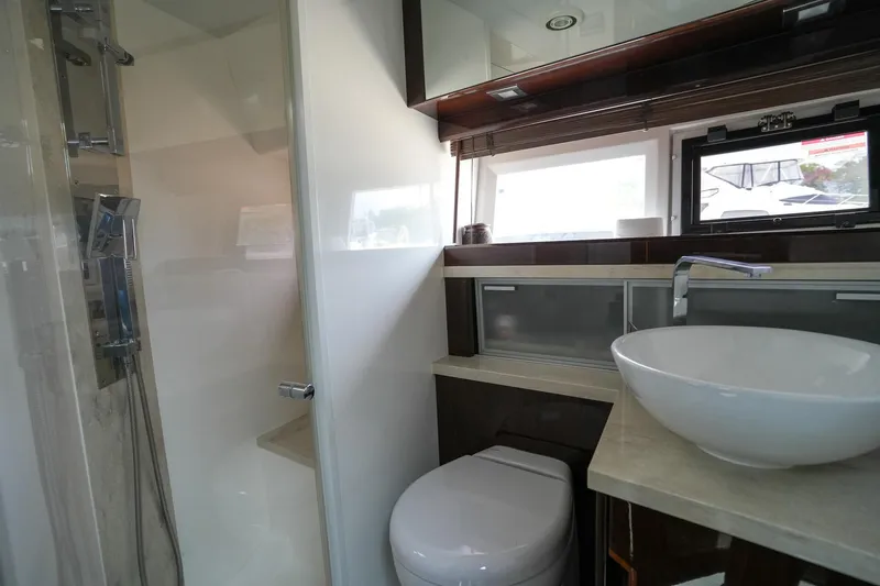  Yacht Photos Pics Modern bathroom in 2017 Galeon 43 SKY yacht with shower, sink, and toilet.