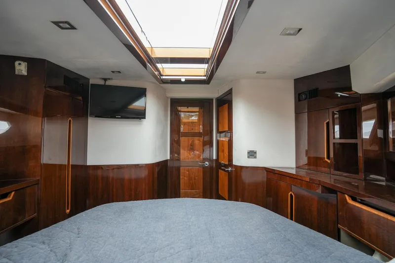  Yacht Photos Pics Luxurious interior of 2017 Galeon 43 SKY yacht with wood finishes and skylight.