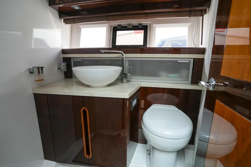  Yacht Photos Pics Luxurious bathroom in 2017 Galeon 43 SKY yacht with modern fixtures and elegant design.