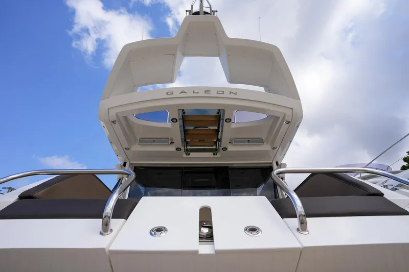  Yacht Photos Pics 2017 Galeon 43 SKY yacht, rear view under blue sky.
