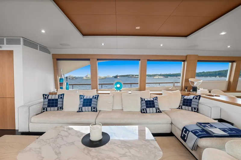 Millesime Yacht Photos Pics Luxurious interior of 2020 Guy Couach 3700 Fly yacht with elegant seating and scenic ocean view.