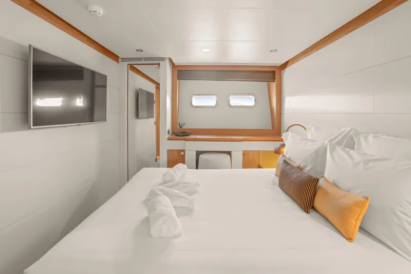 Millesime Yacht Photos Pics Luxurious bedroom interior on 2020 Guy Couach 3700 Fly yacht, featuring modern design and amenities.