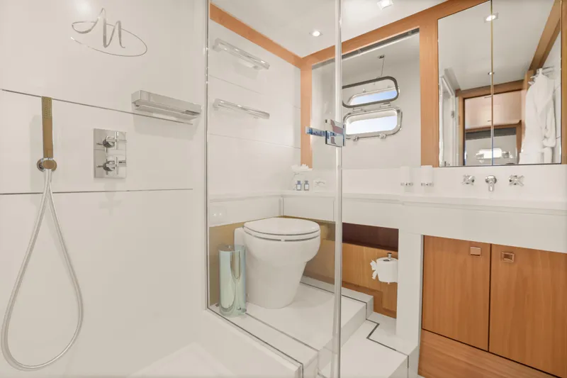 Millesime Yacht Photos Pics Luxurious bathroom on 2020 Guy Couach 3700 Fly yacht, featuring modern fixtures and elegant design.