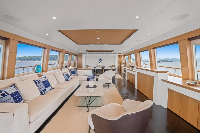 Millesime Yacht Photos Pics Luxurious interior of 2020 Guy Couach 3700 Fly yacht with elegant seating and panoramic windows.